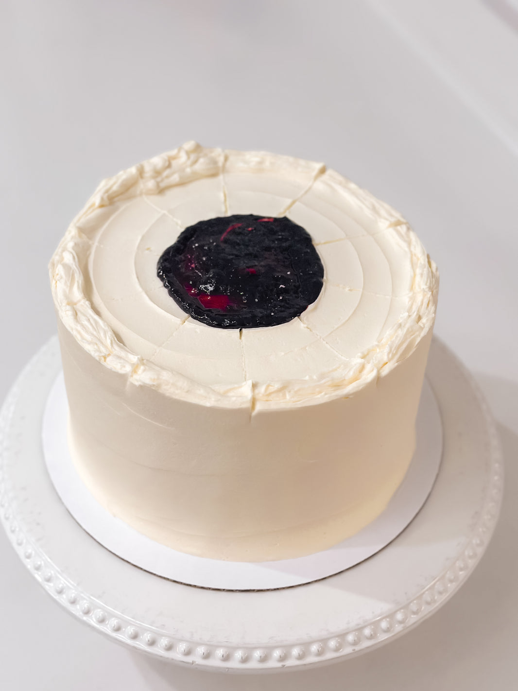Vanilla Cake with Raspberry Preserves